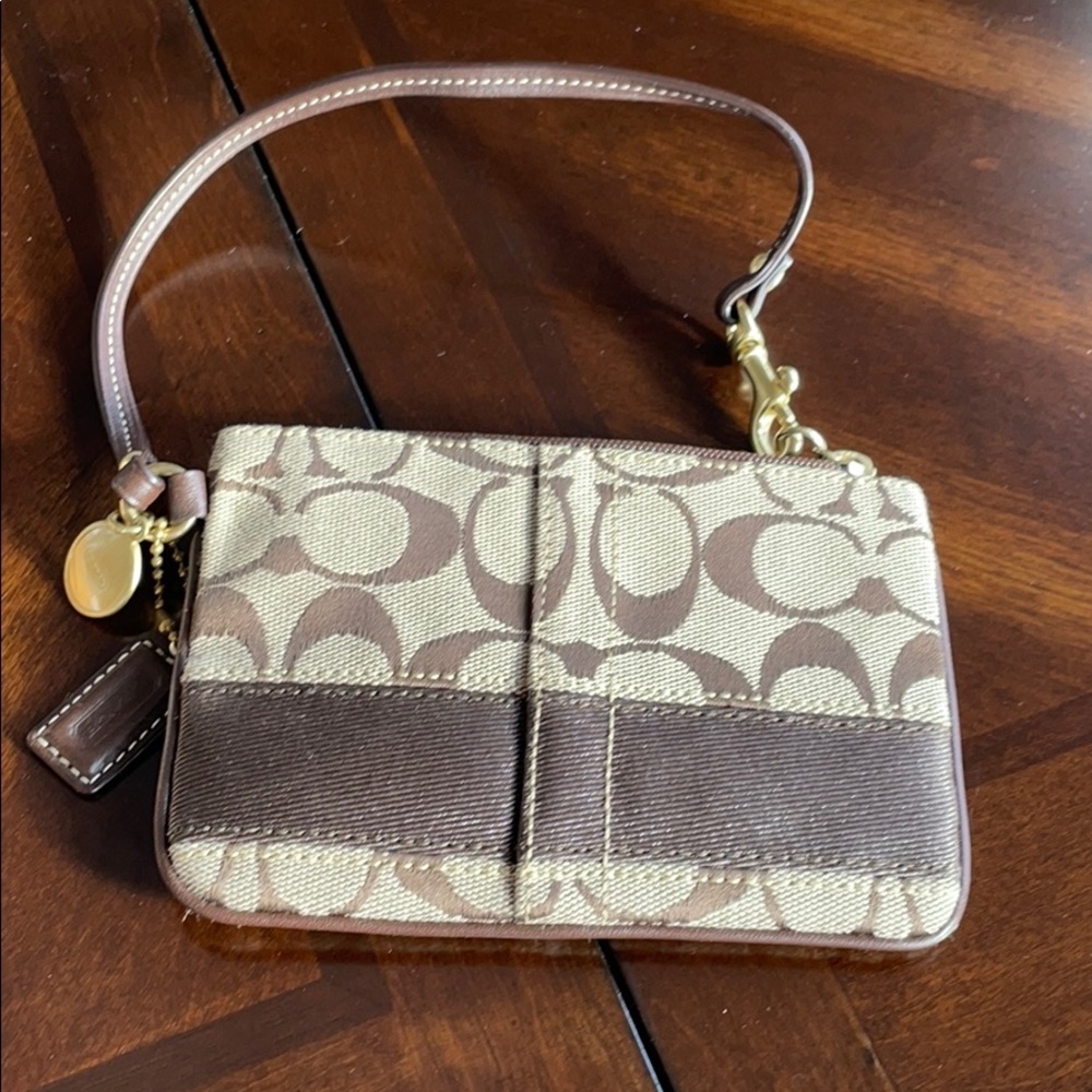 Coach brown and tan logo wristlet